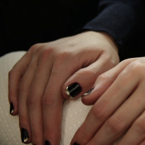 Badgley Mischka Fall 2012, Deborah provide luxury manicures with Dark Side of the Moon, a dark aubergine and French tips with Nefertiti, a frosted metallic gold.